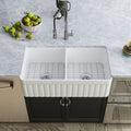 DeerValley Nova DV-1K503 Fireclay White Double Basin Farmhouse Kitchen Sink with Grid & Basket Strainer (33"L x 18"W x 10"H)