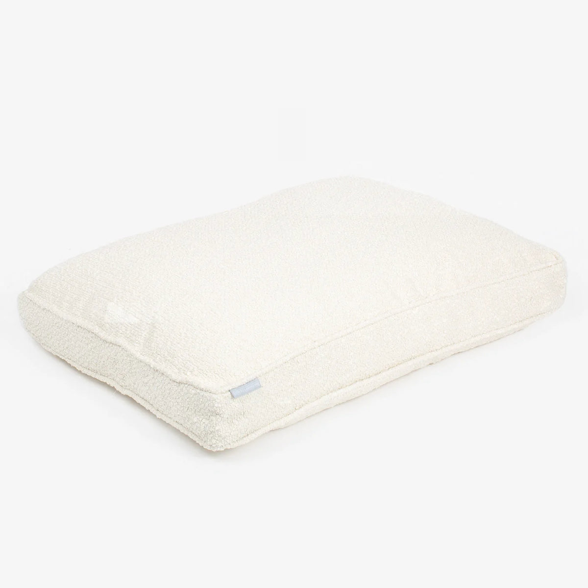 Coussin pour chien en bouclé ivoire
