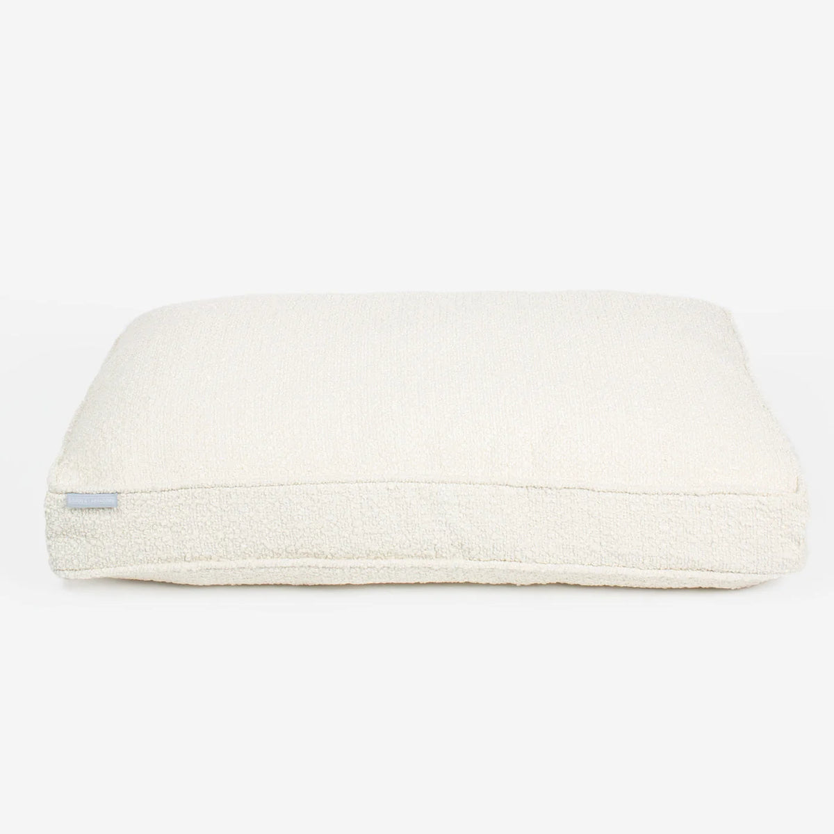 Coussin pour chien en bouclé ivoire